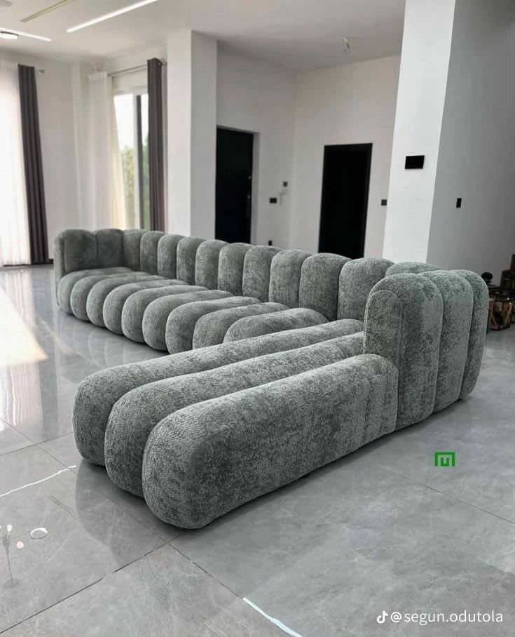 Executive 5-seater sofa. Woolen material, solid wood framework, imported cotton finishings. Very beautiful for your office, living room, parlor and other group spaces.