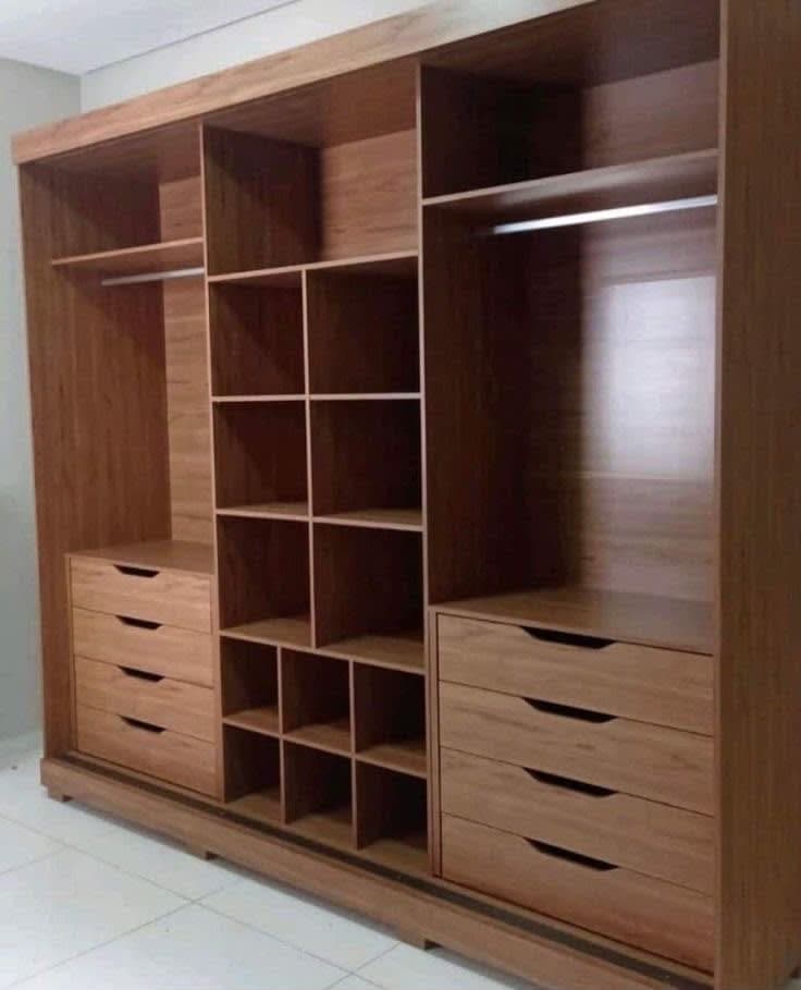 Wardrobe with lots of storage spaces. Useful for hanging clothes, Makeup, storing briefs, and more.
This wardrobe comes with a dedicated chair and a make up table